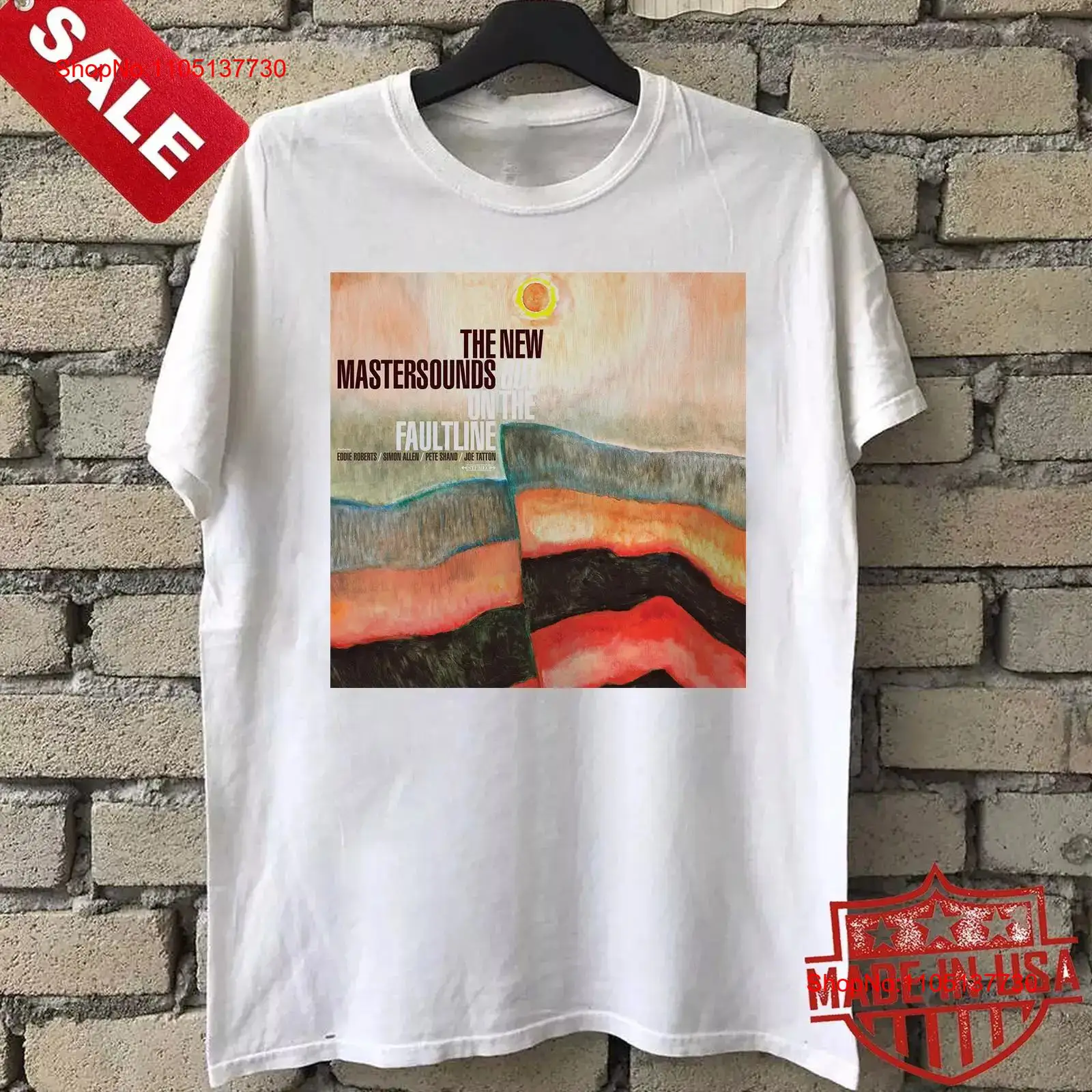 Vintage Fashion News - เสื้อยืดวงดนตรี The New Mastersounds รุ่น Out
